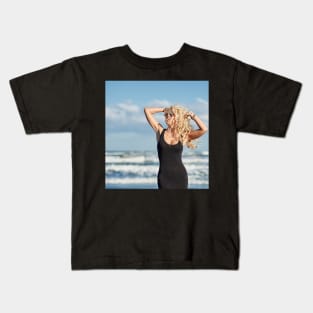 Sexy woman on the sea shore Kids T-Shirt